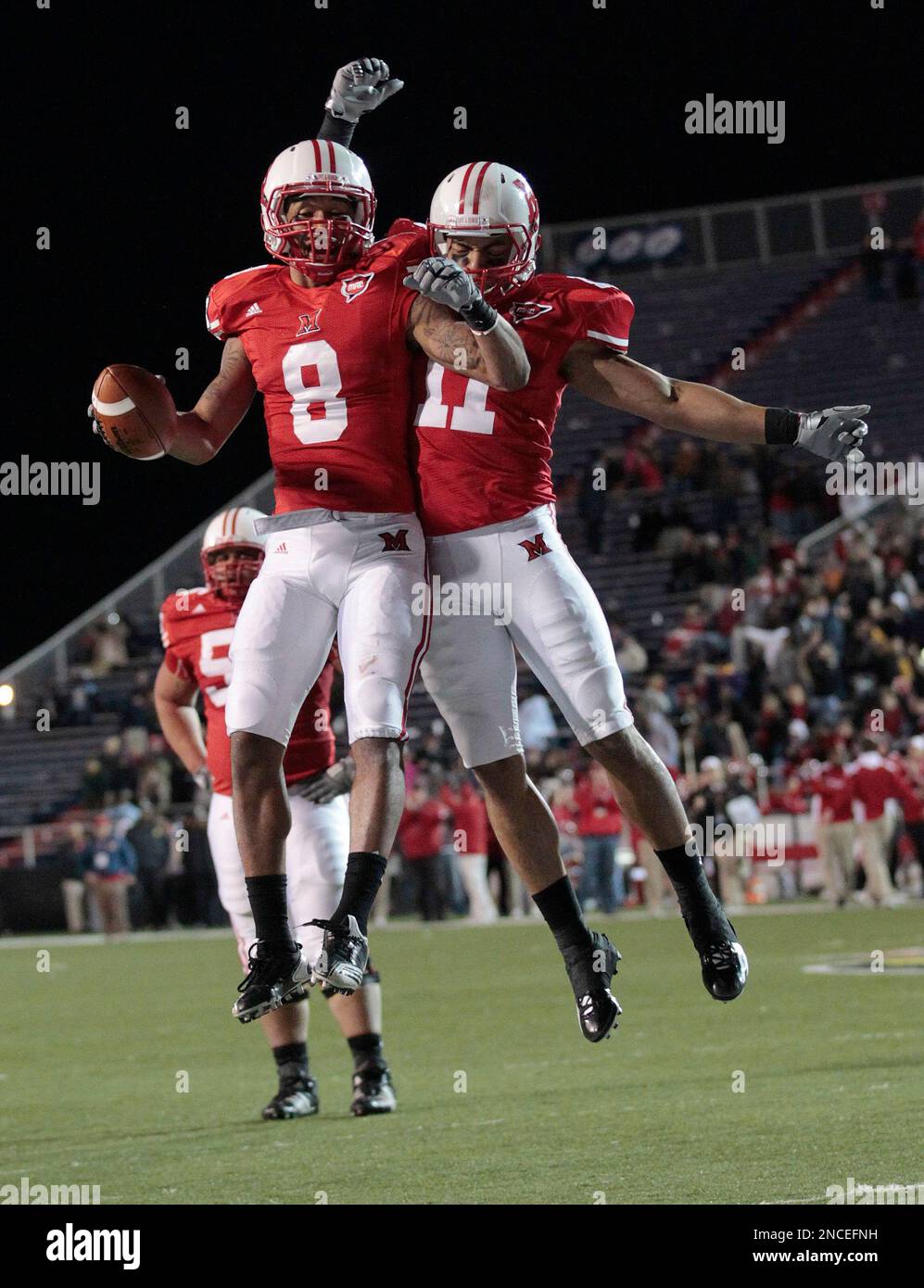Miami of Ohio receiver Nick Harwell (8) celebrates with teammate Armand