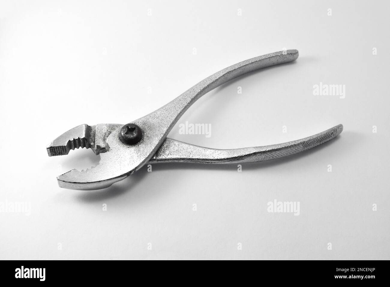 slip joint adjustable pliers wrench isolated in white background Stock