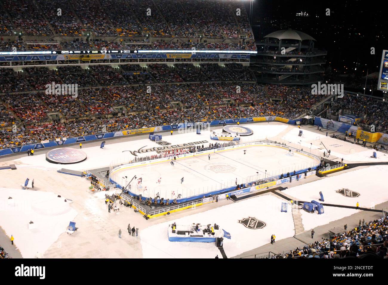 Over 60,000 people jam Heinz Field to watch the NHL Winter Classic hockey game between the Pittsburgh Penguins and the Washington Capitals in Pittsburgh, Saturday, Jan