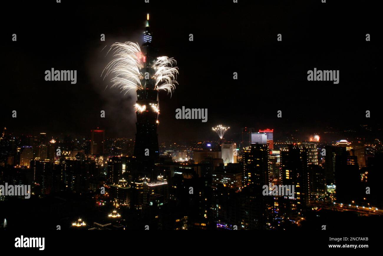 A firework display explodes off Taiwan's tallest skyscraper Taipei101