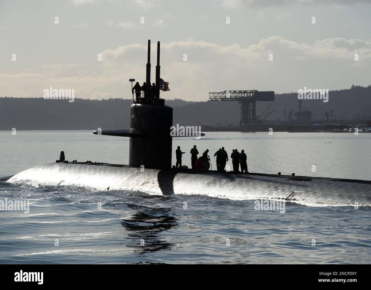230210-N-ED185-1263  PUGET SOUND, Wash. (Feb. 10, 2023) The Los Angeles-class fast-attack submarine USS Key West (SSN 722) transits the Puget Sound before mooring at Naval Base Kitsap – Bremerton, Washington, February 10, 2023. Measuring more than 360 feet long and weighing more than 6,900 tons when submerged, Key West supports a multitude of missions to include anti-submarine warfare, anti-surface ship warfare, surveillance and reconnaissance, and strike warfare. (U.S. Navy Photo by Mass Communication Specialist 1st Class Brian. G. Reynolds) Stock Photo
