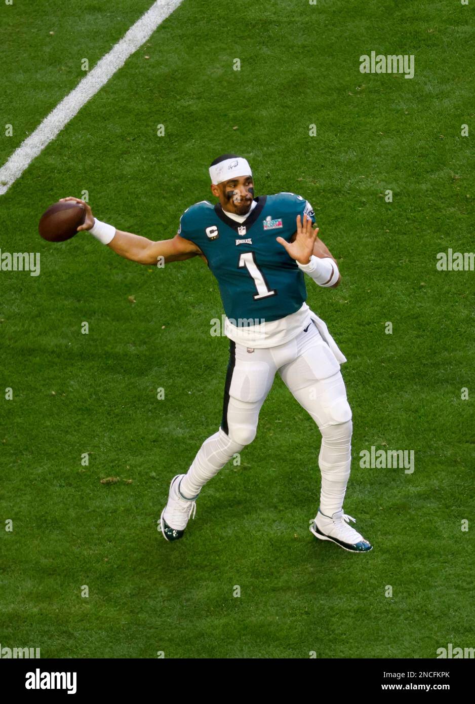 Philadelphia Eagles quarterback Jalen Hurts (1) warms up against the