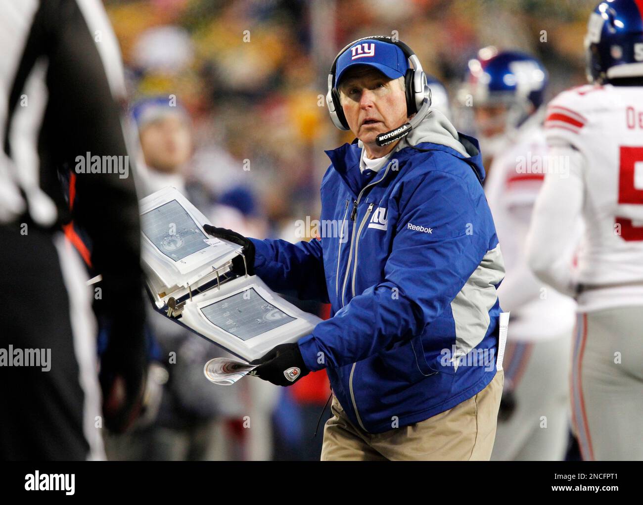 New York Giants head coach Tom Coughlin reacts during the first half of