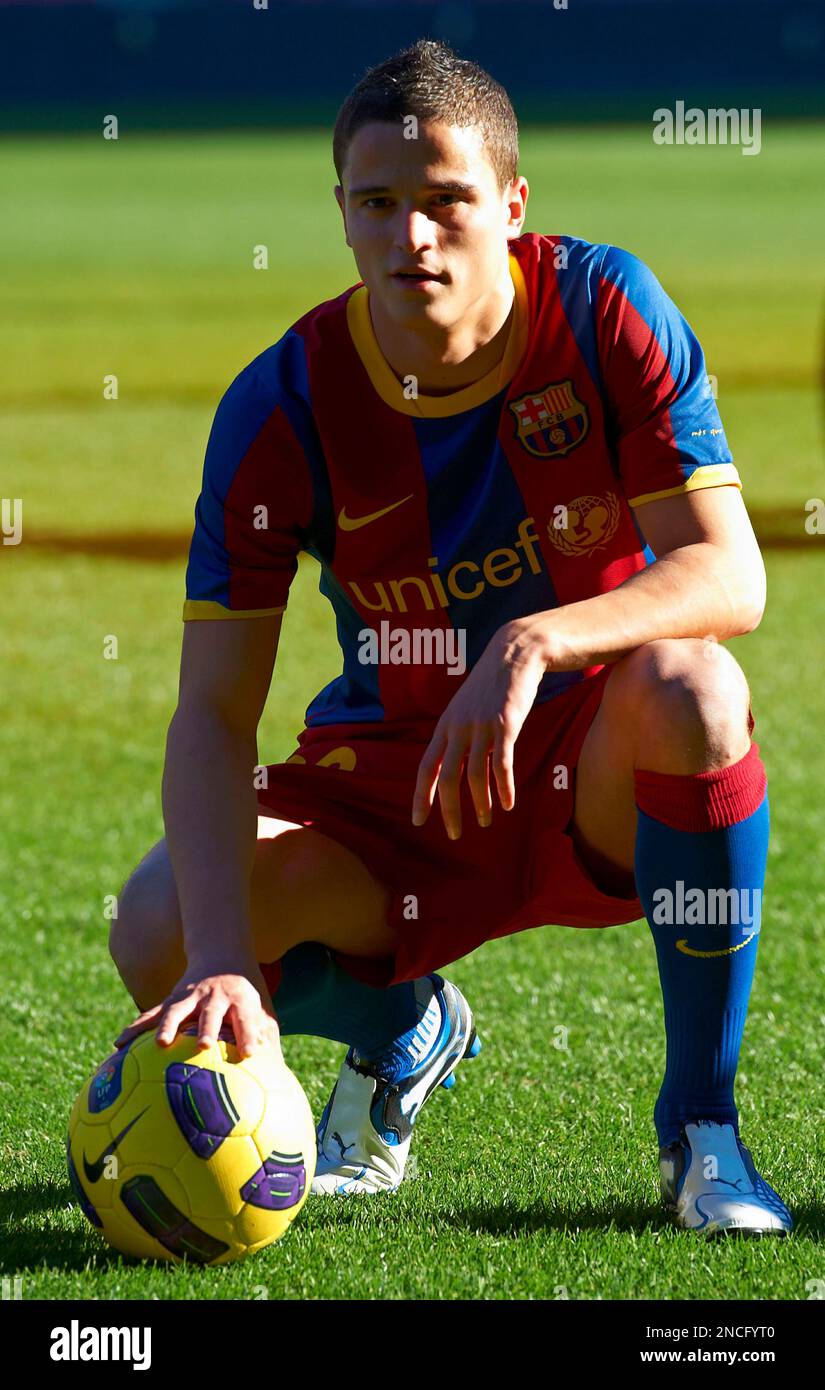 FC Barcelona’s new signing Ibrahim Afellay of the Netherlands poses