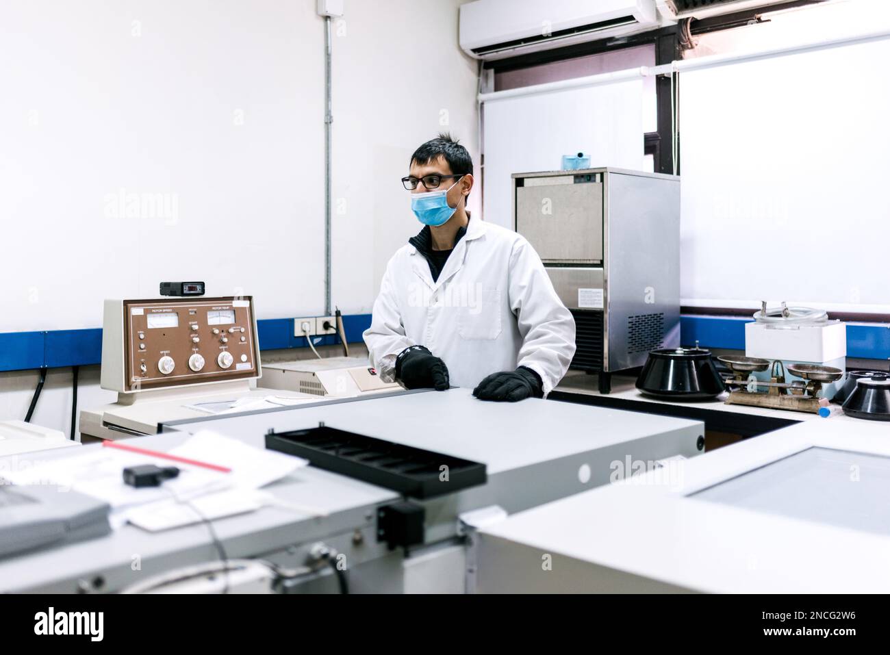 Male Scientist Working in Laboratory Stock Photo