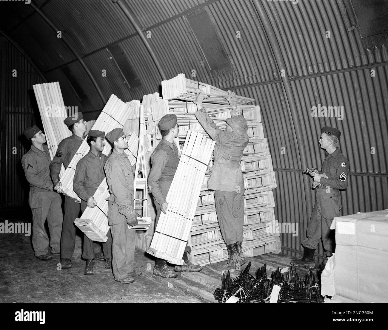 American soldiers store crutches in a medical depot in England, Jan. 29