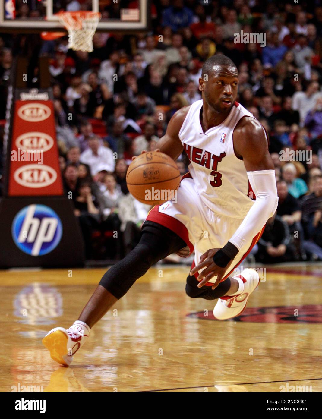 Miami Heat's Dwyane Wade drives against the Cleveland Cavaliers in the