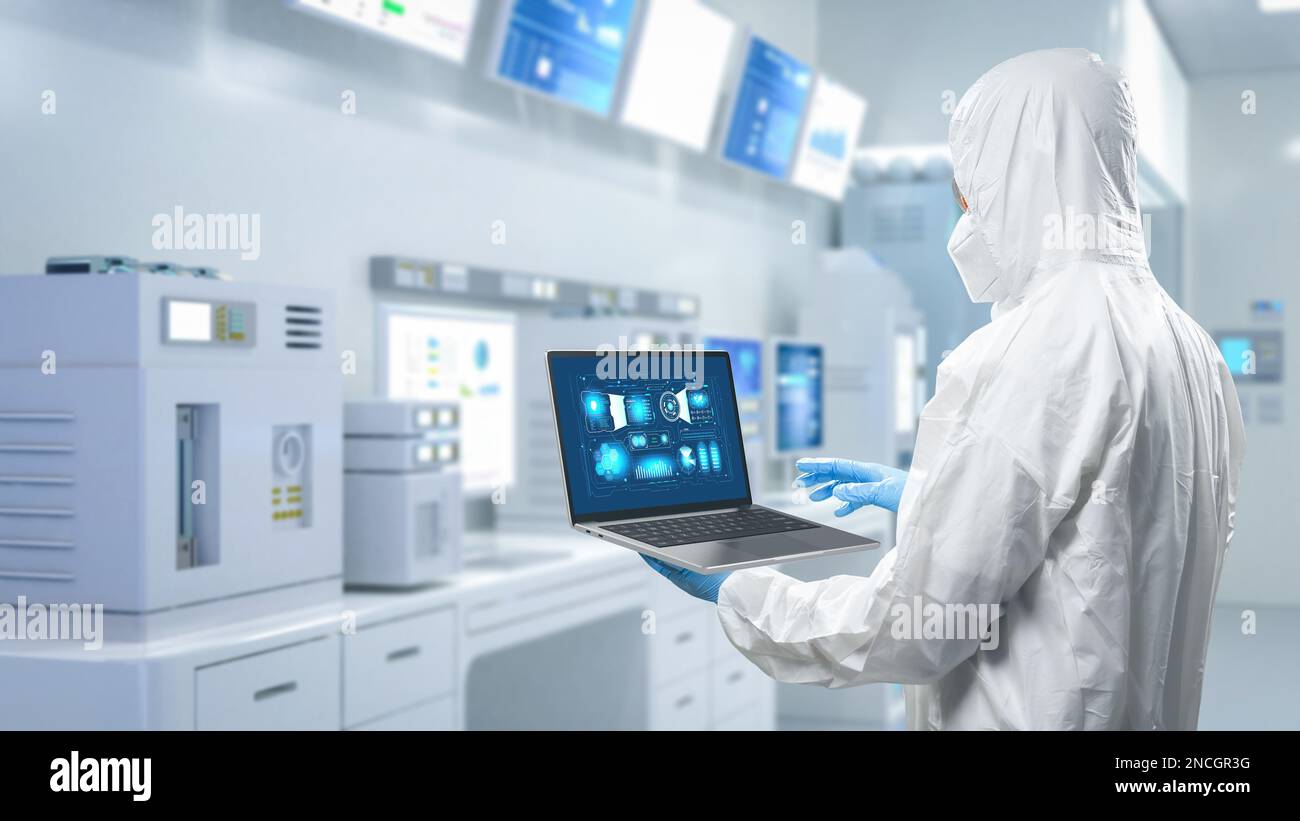 Worker or engineer wears protective suit or white coverall suit work in ...