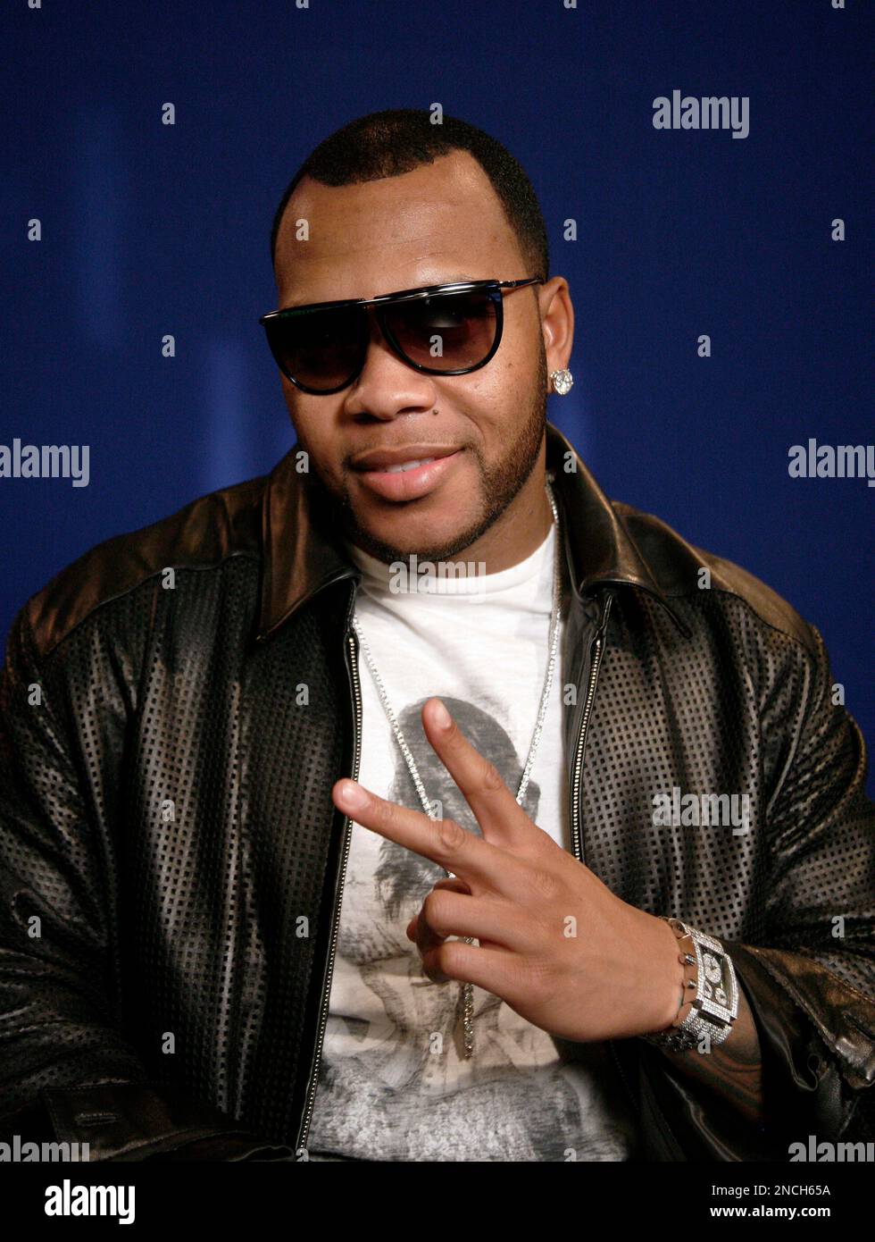 Flo Rida 2010s FILE - In this Dec. 2, 2010 file photo, recording artist Flo Rida poses ...