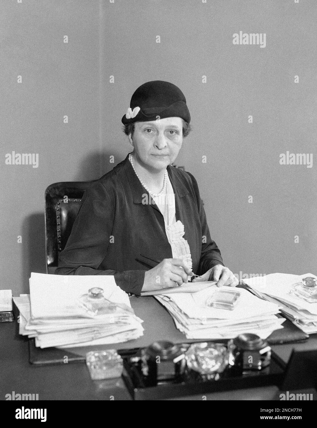 Miss Frances Perkins, New York State Secretary of Labor, showing her in