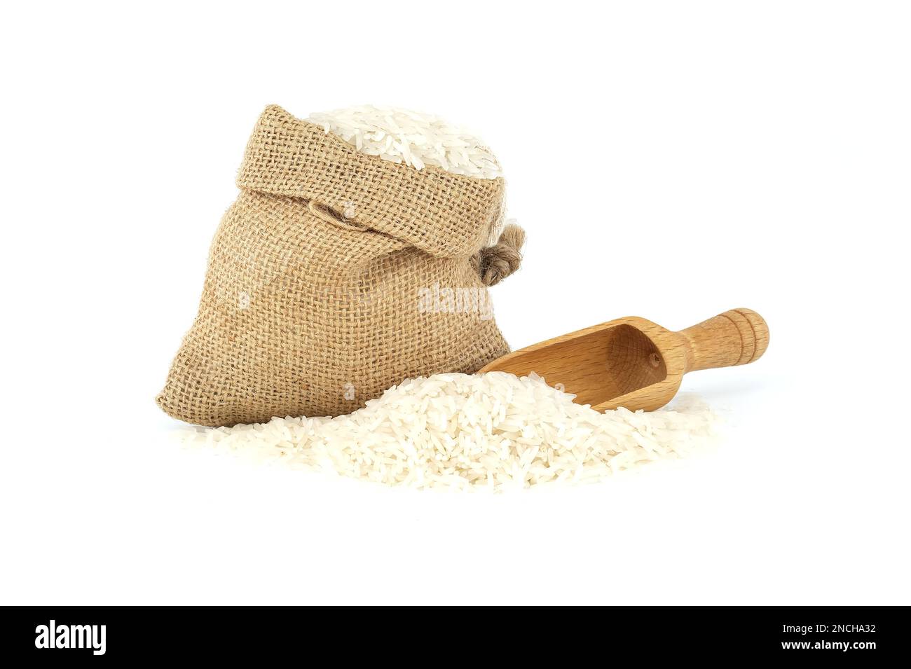 Uncooked long-grain basmati rice in small burlap sack and wooden scoop ...