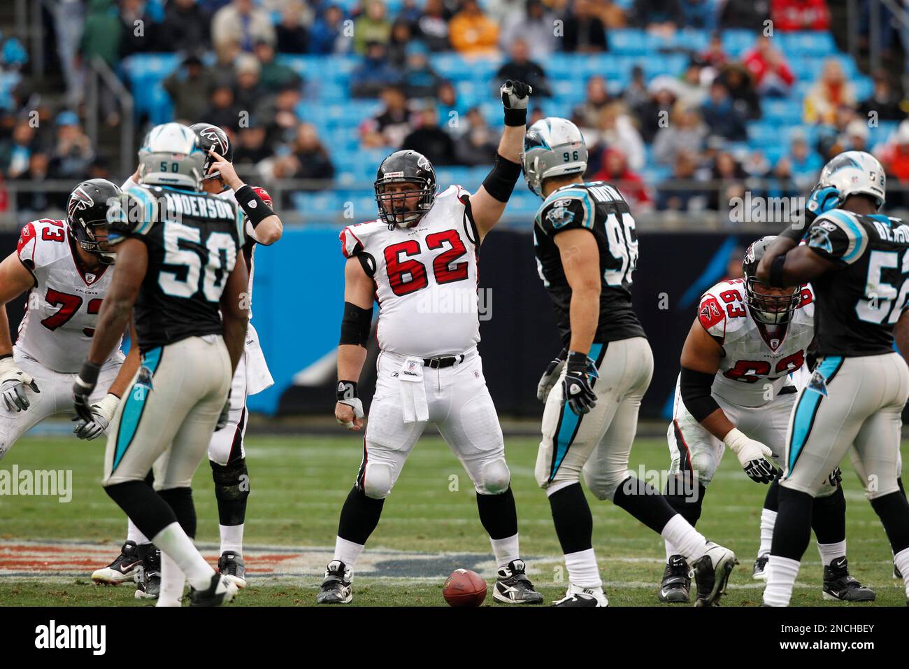 Atlanta Falcons' Todd McClure (62) directs the team against the