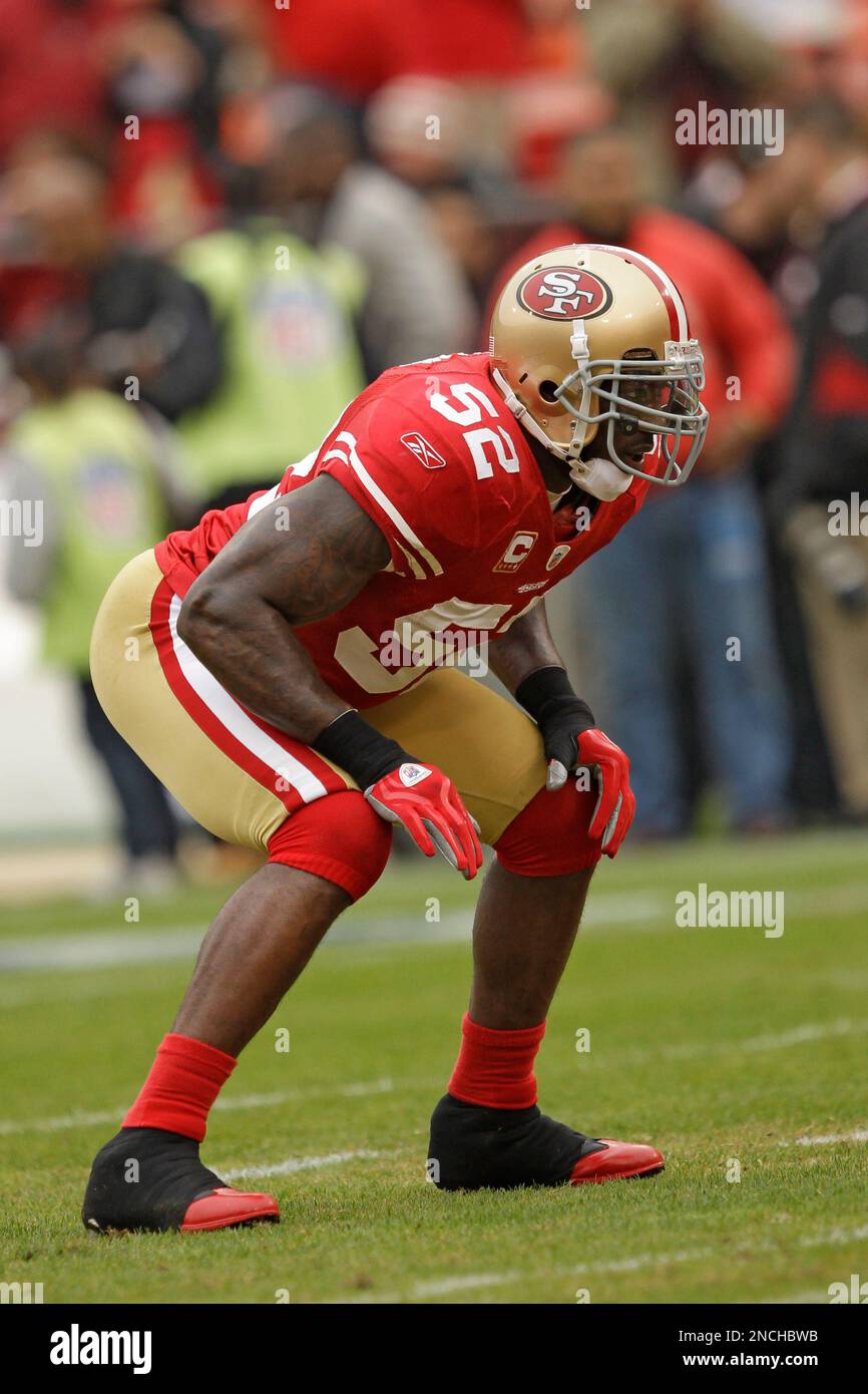 San Francisco 49ers linebacker Patrick Willis (52) gives a high five to  linebacker NaVorro Bowman (53) after stopping the New England Patriots in  the fourth quarter at Gillette Stadium in Foxborough, Massachusetts