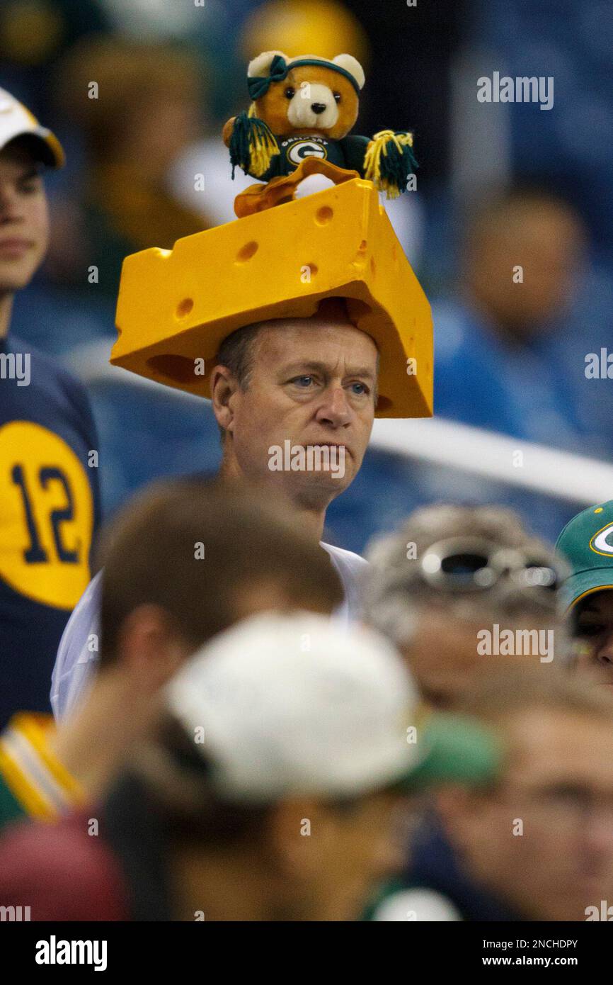 Green Bay Packer fan with cheese head at the NFL football game between