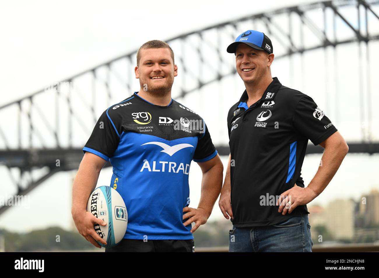 Super Rugby's (lt-rt) senior player Tom Robertson and head coach Simon Cron  of the Western Force during the Super Rugby Pacific season launch set  against the backdrop of the Sydney Harbour Bridge