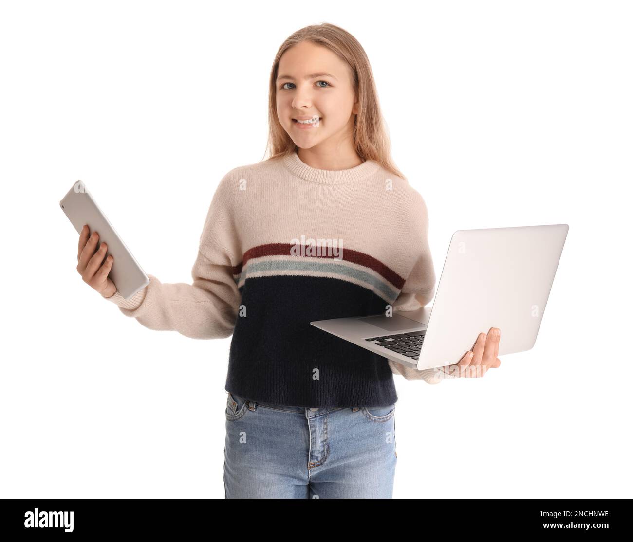 Little girl with laptop and tablet computer on white background Stock ...