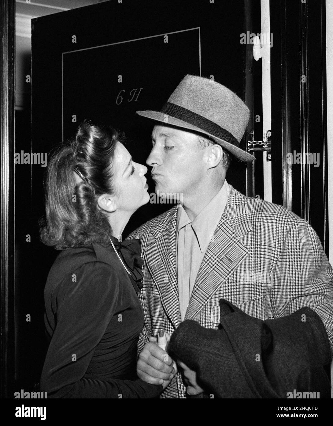 Bing Crosby and his wife Dixie Lee see each other at a New York Hotel