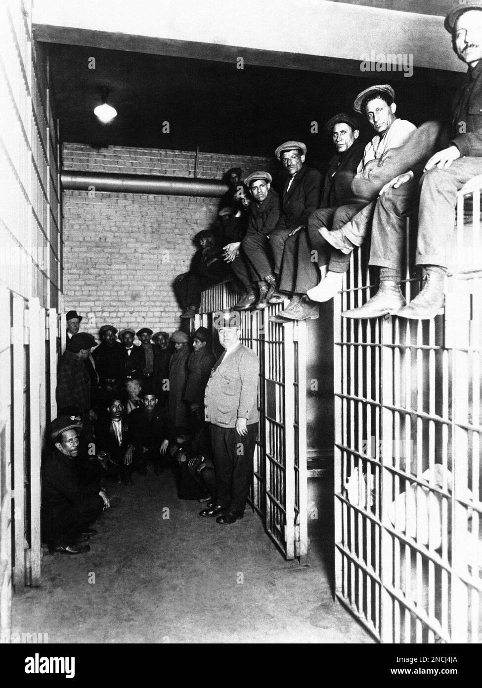Prisoners sitting on top of cells at in a prison in Canton, Ohio as the
