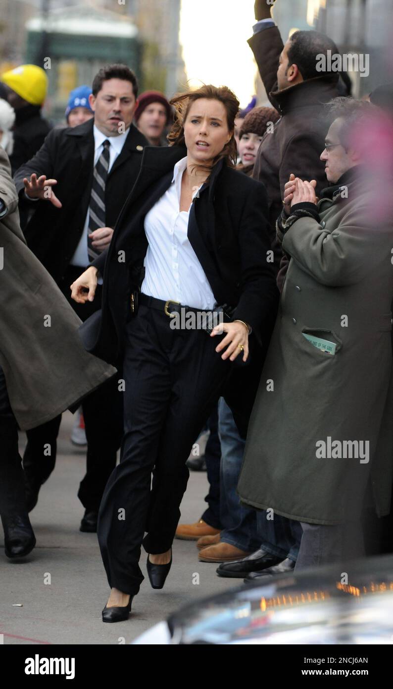 Actress Tea Leoni films a scene on the set of "Tower Heist" in New York