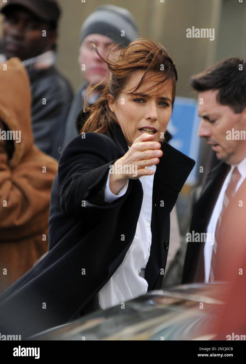 Actress Tea Leoni films a scene on the set of "Tower Heist" in New York