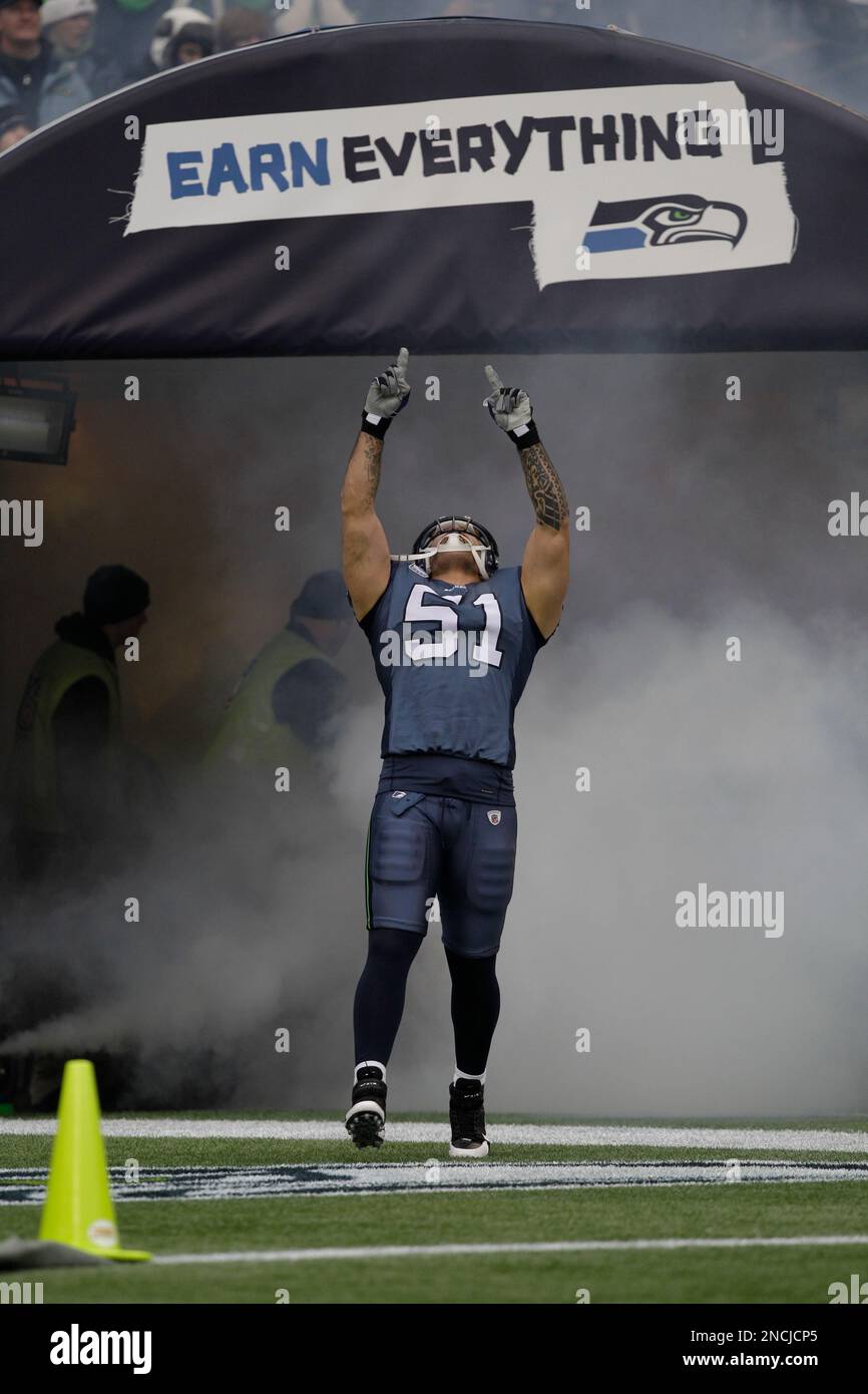 Seattle Seahawks Lofa Tatupu is introduced before an NFL football game  against the San Francisco 49ers, Sunday, Sept. 12, 2010, in Seattle. (AP  Photo/Ted S. Warren Stock Photo - Alamy