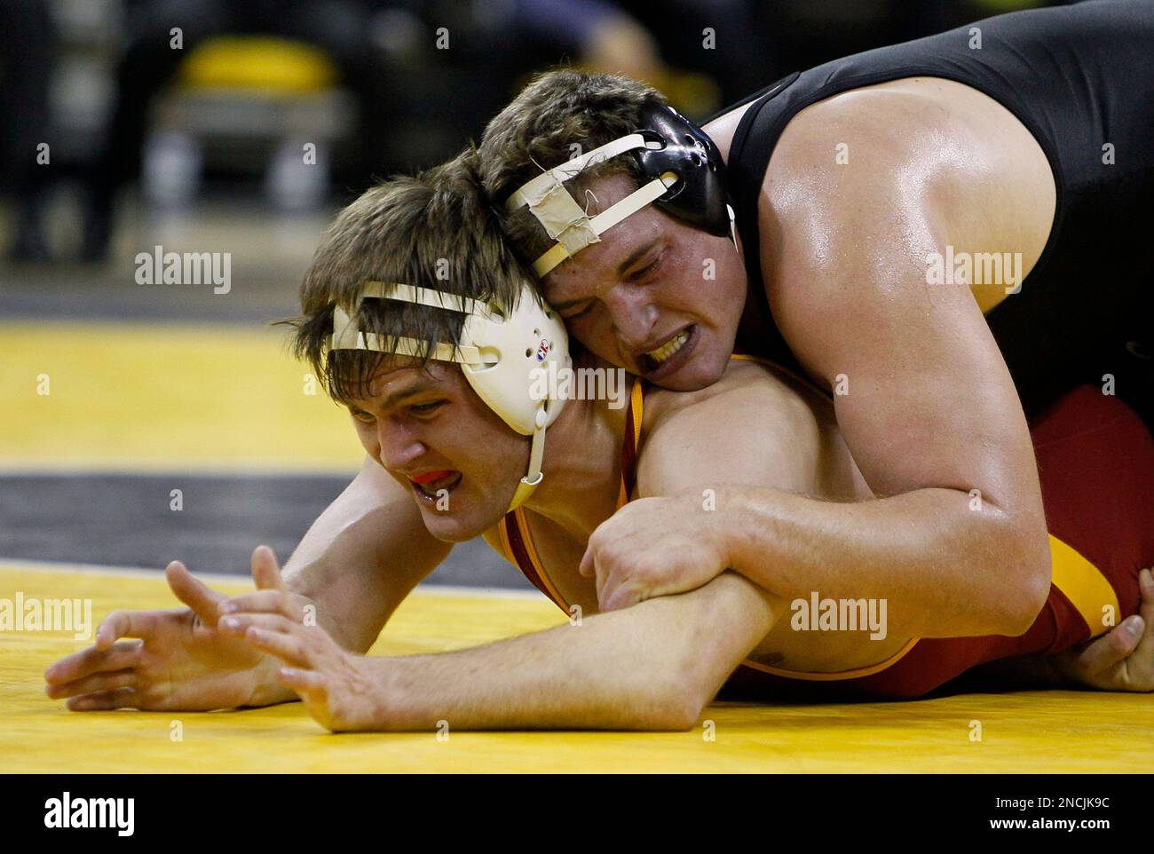 Iowa's Blake Rasing, right, controls Iowa State's Kyle Simonson during ...