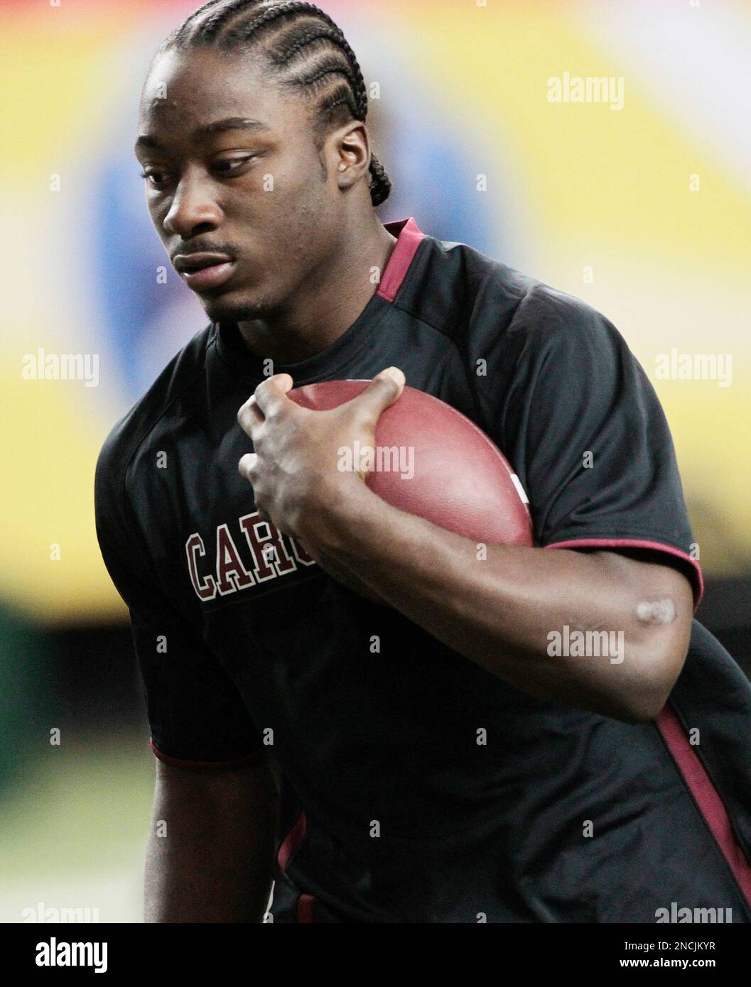 South Carolina running back Marcus Lattimore runs with a ball during