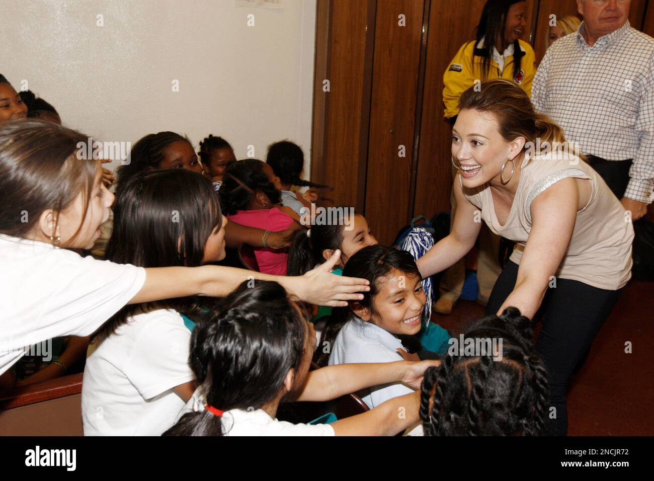 Actress Hilary Duff greets students at Normandie Elementary School as