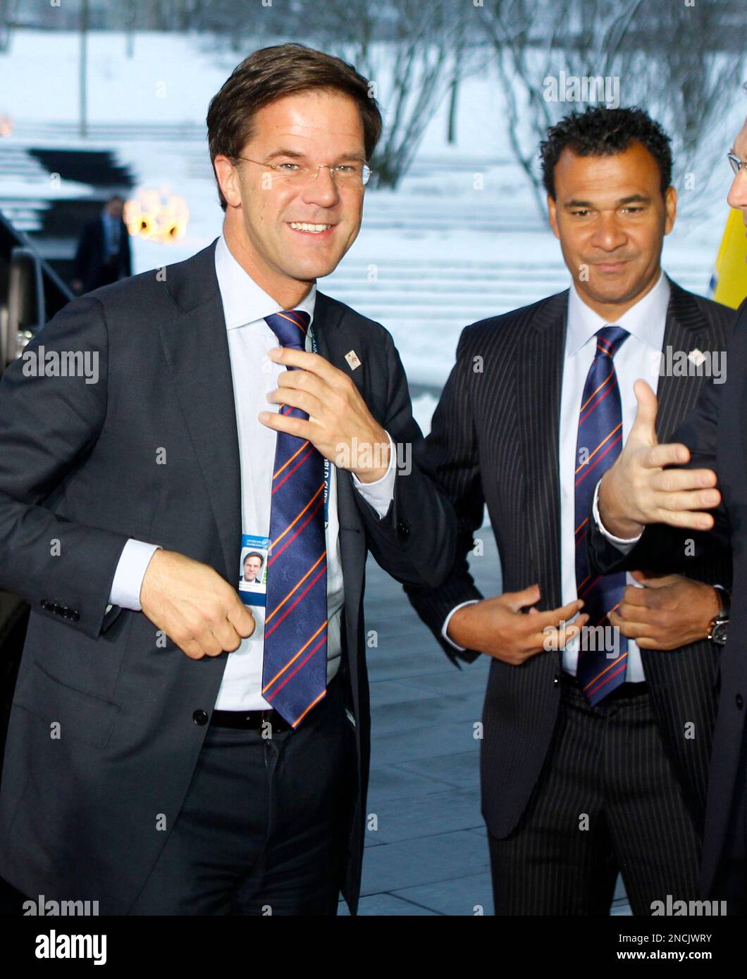 Prime Minister of the Netherlands Mark Rutte, left, and former soccer ...