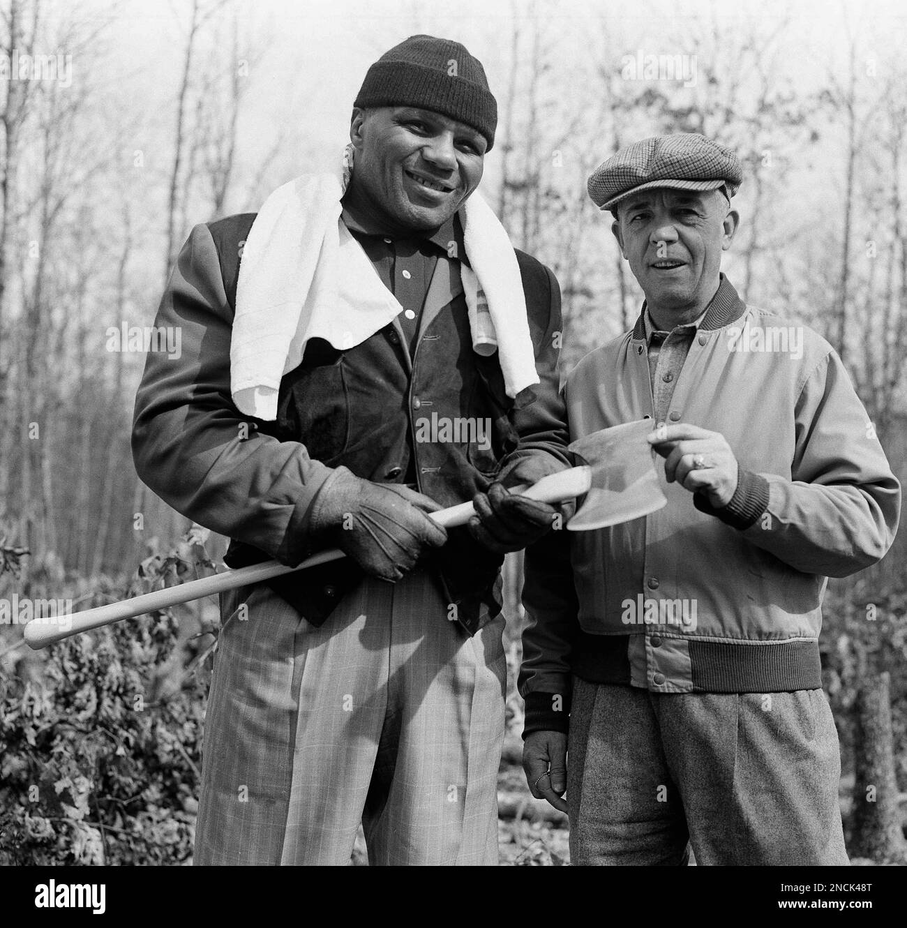 Jersey Joe Walcott, left, is shown with his trainer, Dan Florio at