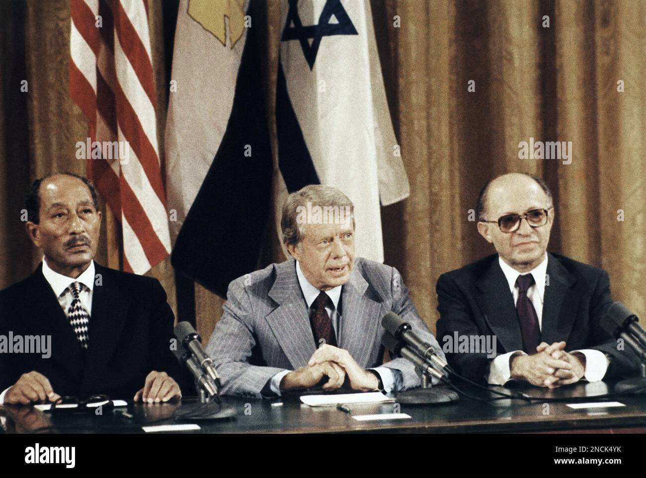 President Jimmy Carter is flanked by Israeli Prime Minister Menachem