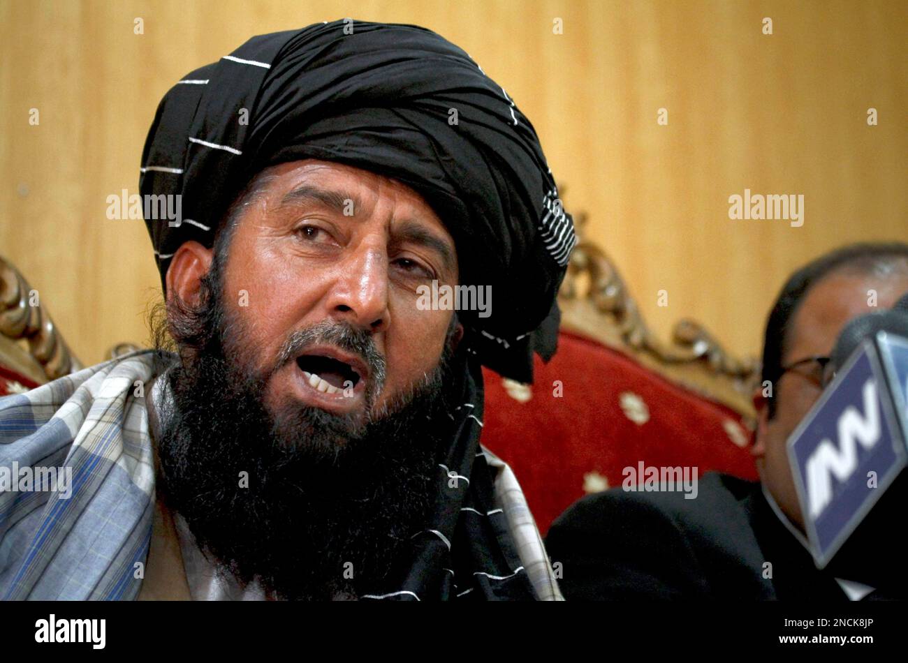 Kareem Khan, Pakistani tribesman from North Wazirstan, talks to the media  in Islamabad, Pakistan, on Monday, Nov. 29, 2010. Khan, says he lost his  son and brother in an American missile attack