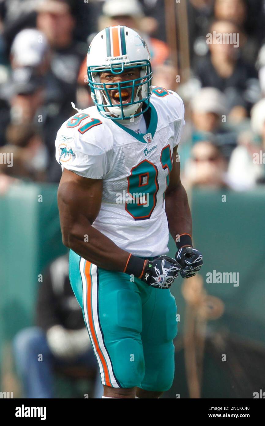 Miami Dolphins linebacker Cameron Wake (91) in action during the first  quarter of an NFL football game in Oakland, Calif., Sunday, Nov. 28, 2010.  (AP Photo/Tony Avelar Stock Photo - Alamy