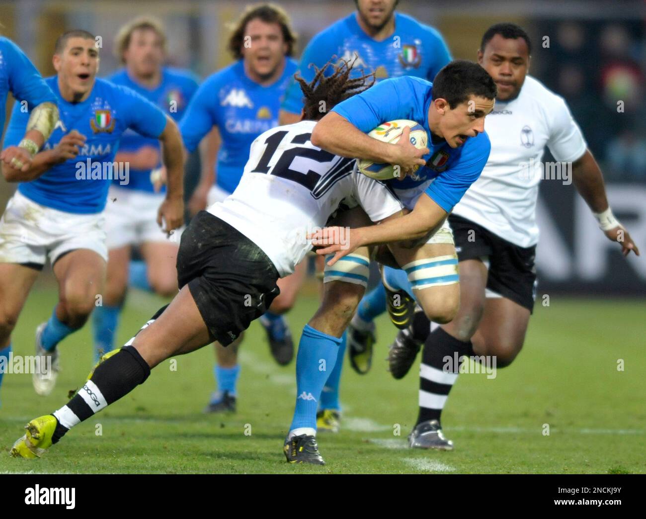 Italy's Paul Derbyshire, right, is tackled by Fiji Islands's Gabiriele  Lovobalavu during the international rugby union match between Italy and  Fiji Islands at the Alberto Braglia Stadium in Modena, Italy, Saturday, Nov.
