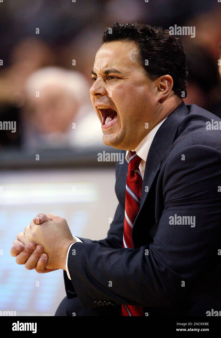 Arizona head coach Sean Miller instructs his team during the second ...