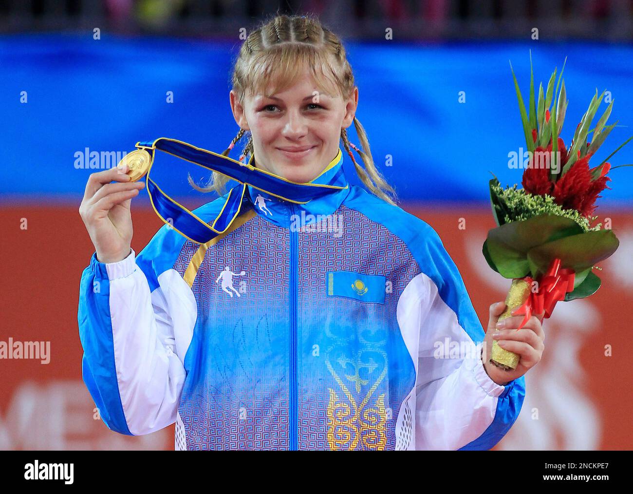 Kazakhstan's Yelena Shalygina celebrates during the award ceremony of ...