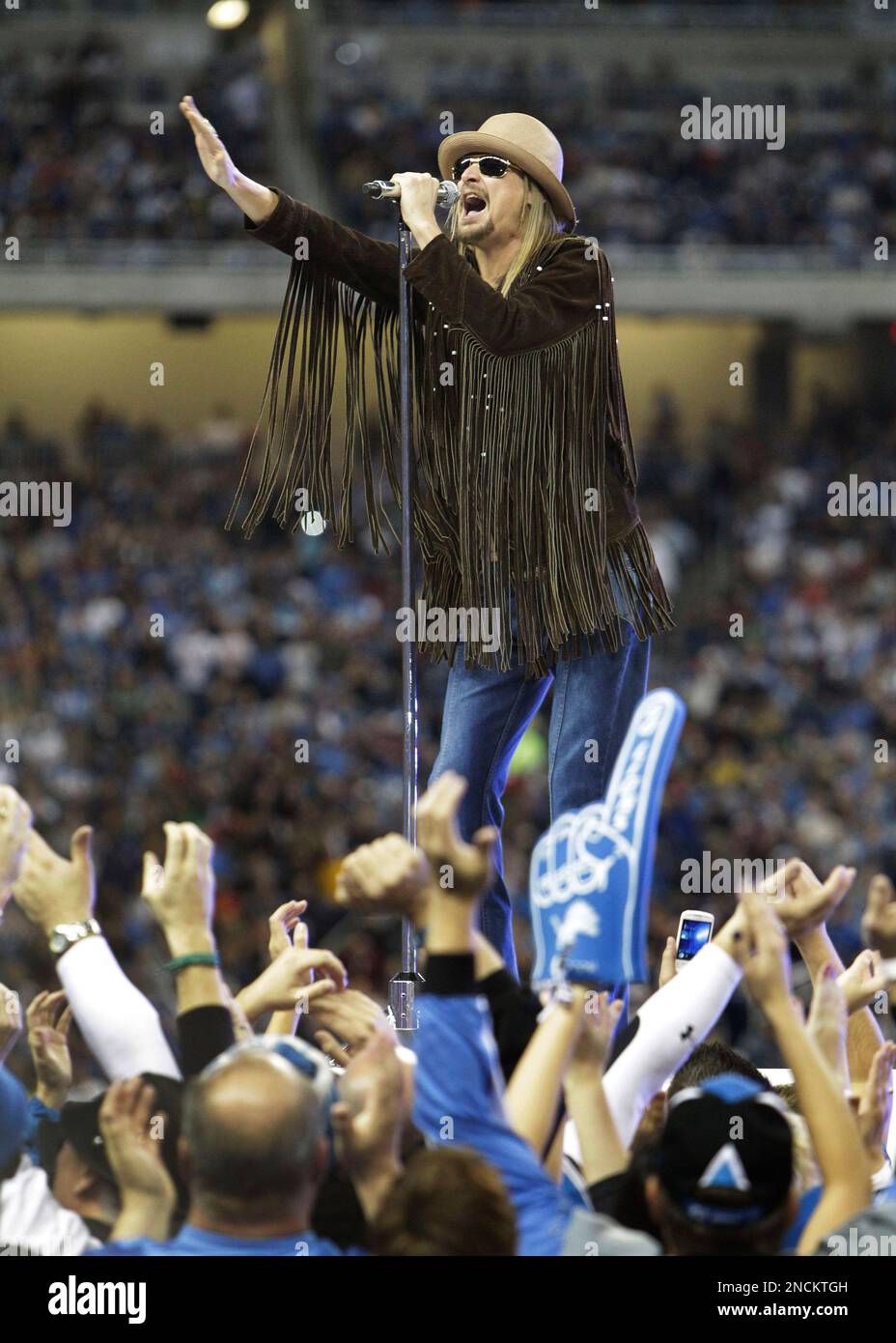 Musician Kid Rock performs during the half time ceremony at the NFL ...