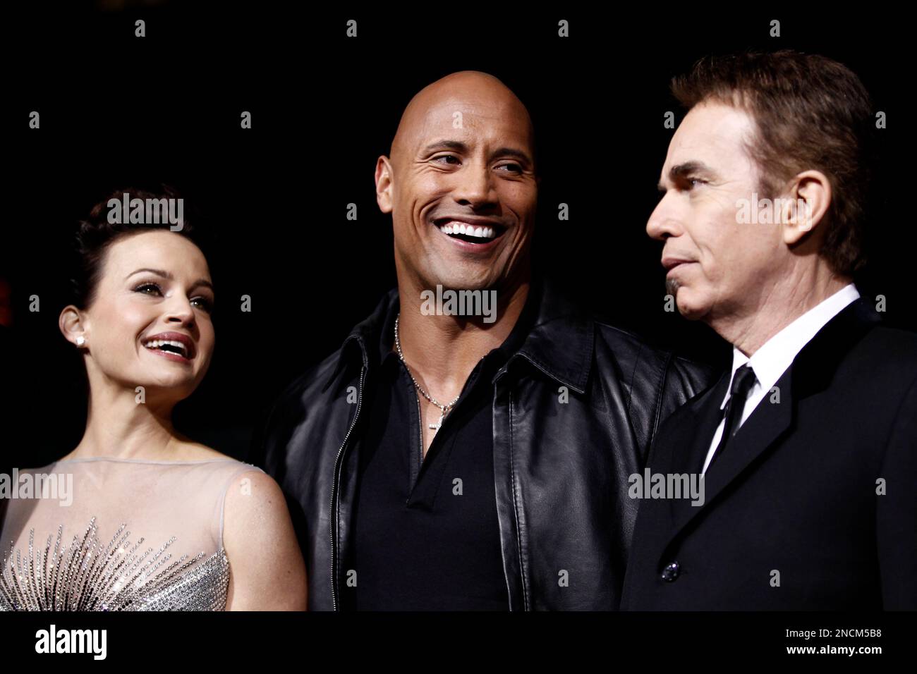 Cast members Dwayne Johnson, center, Carla Gugino, left, and Billy Bob ...