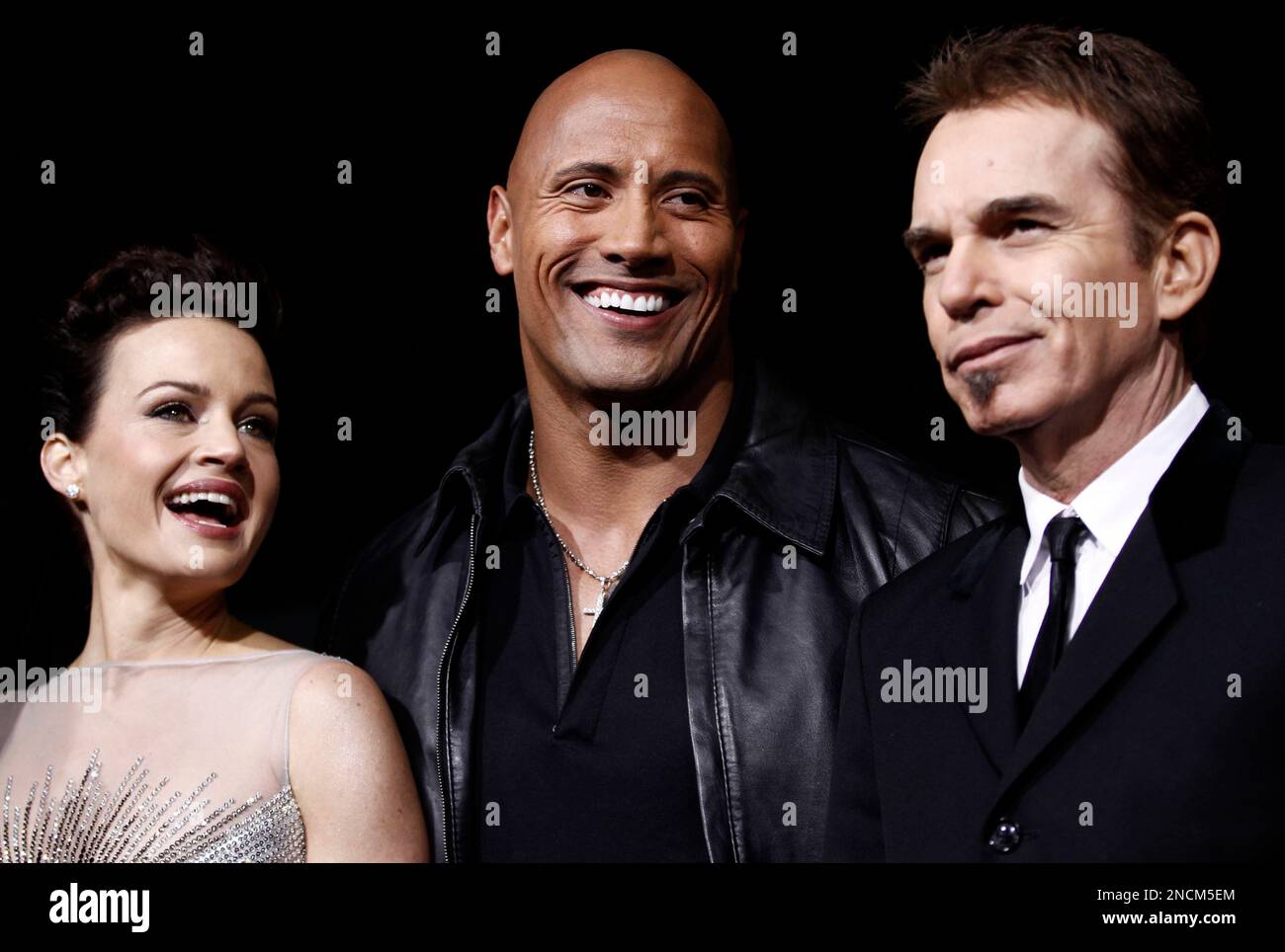 Cast members Dwayne Johnson, center, Carla Gugino, left, and Billy Bob ...