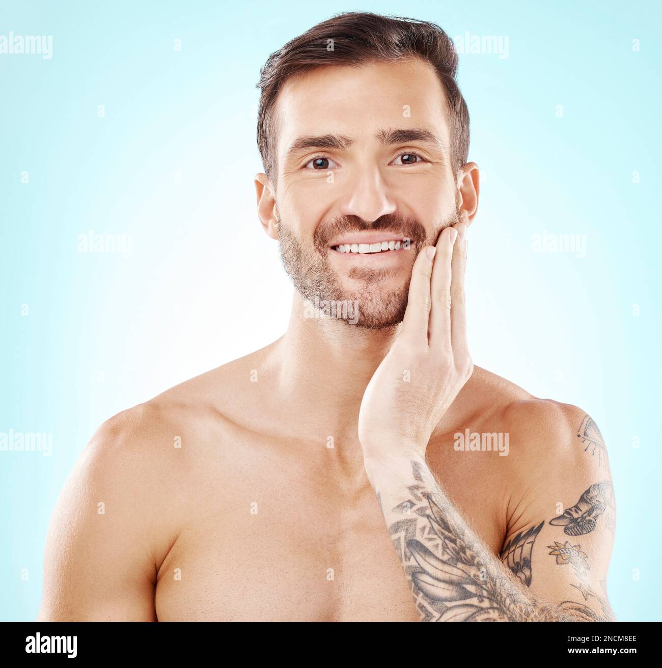 Face, portrait and skincare of man in studio isolated on a blue ...