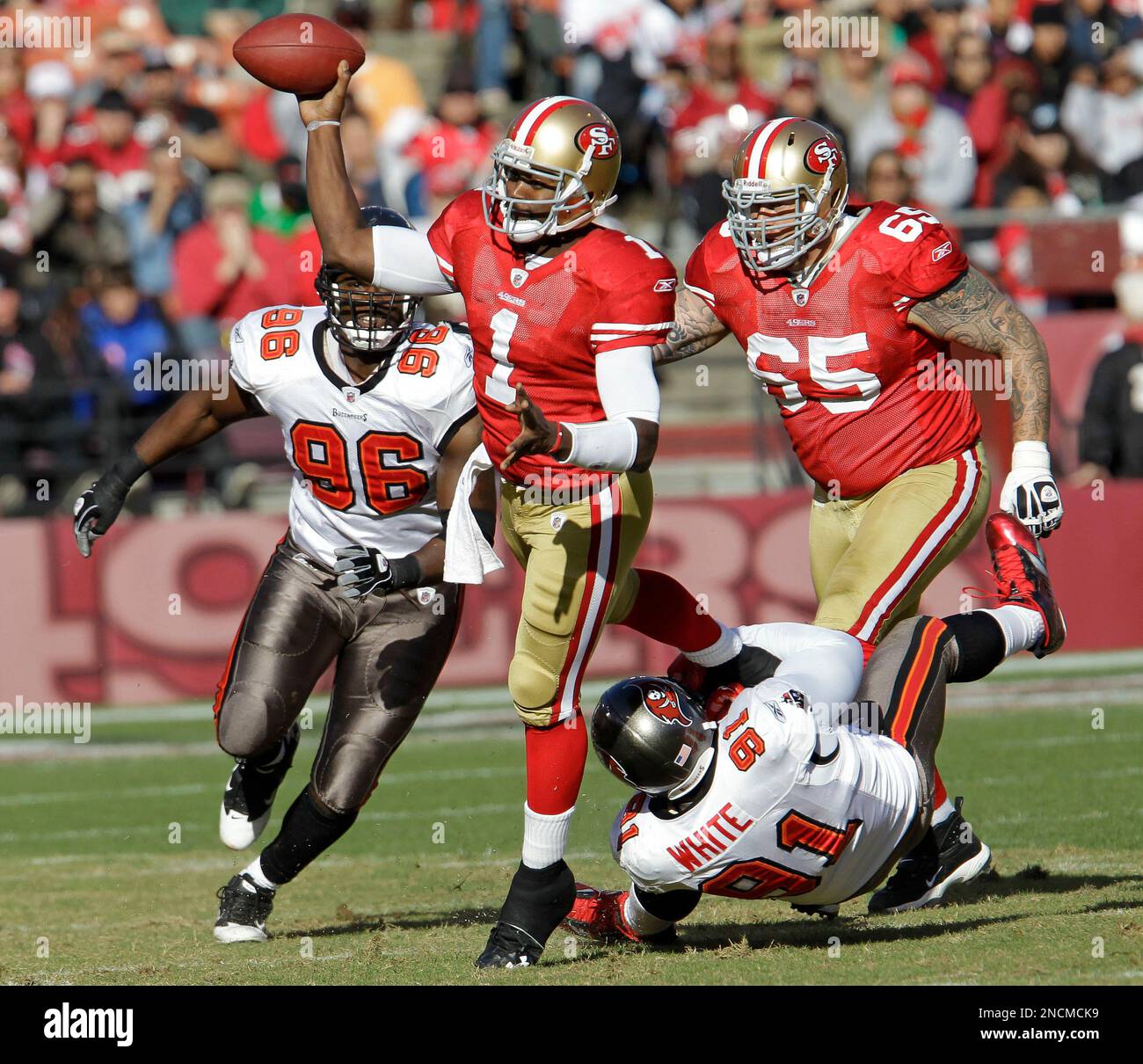 San Francisco 49ers quarterback Troy Smith (1) is pressured by