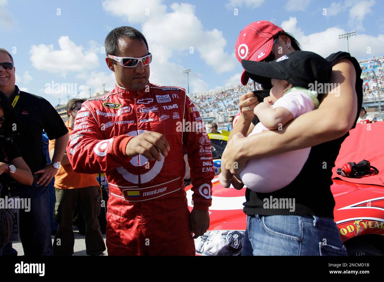 NASCAR driver Juan Pablo Montoya with his wife, Connie and four month
