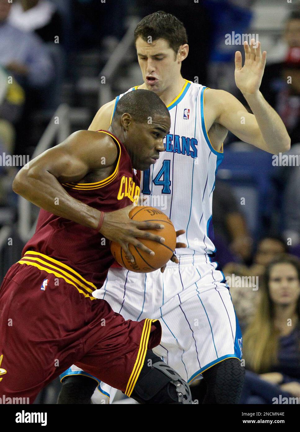 Cleveland Cavaliers forward Antawn Jamison, left, attempts to drive ...