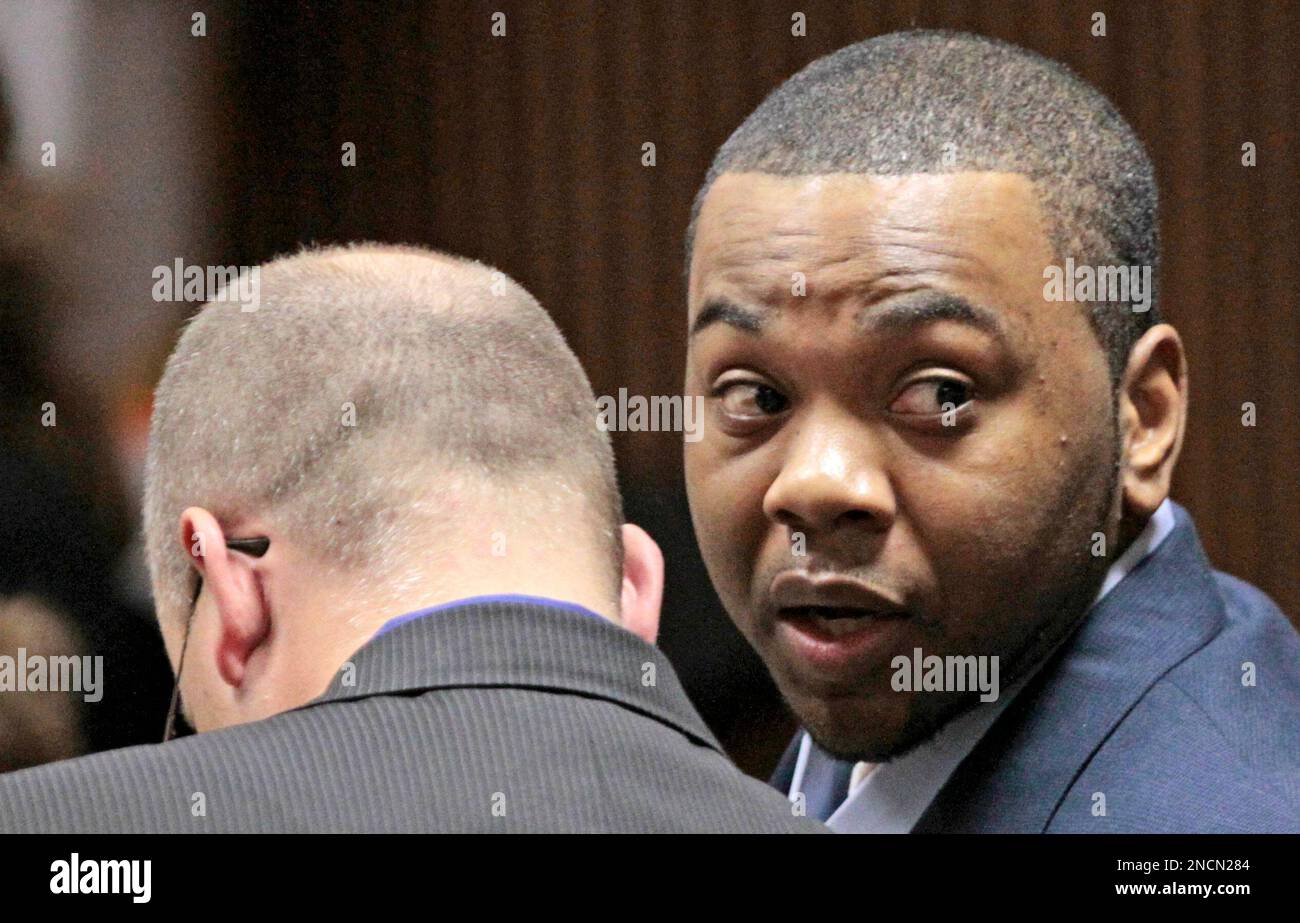 Murder defendant Courtney Lockhart listens during opening statements