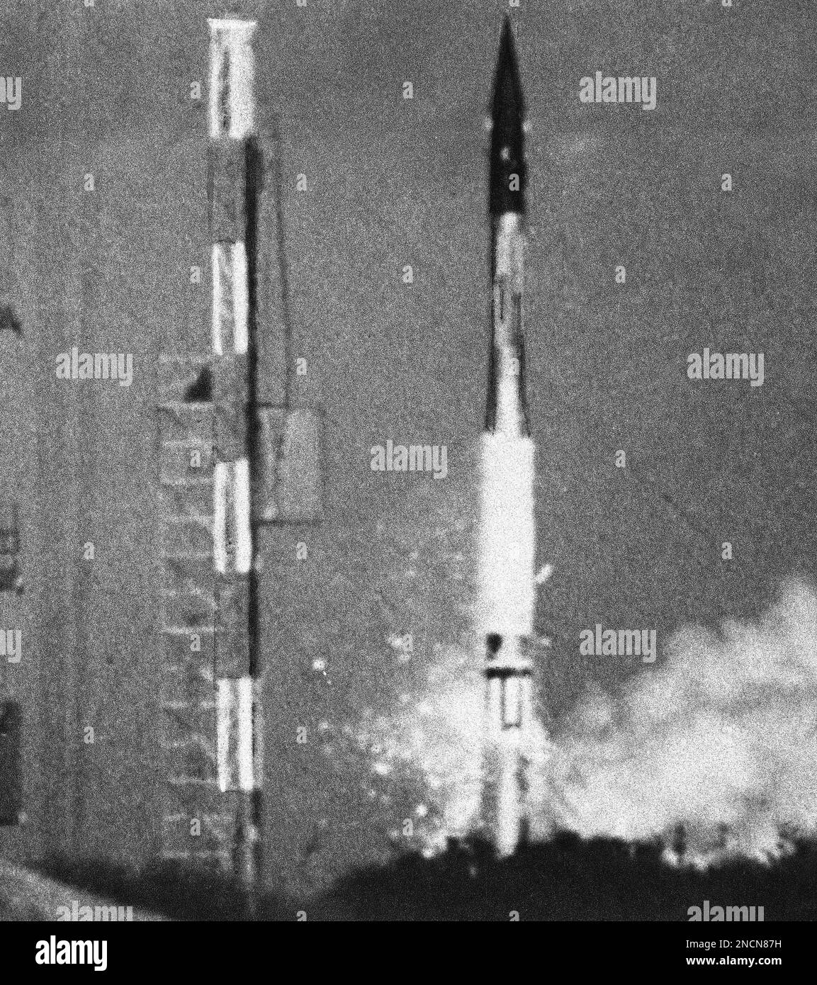 The Vanguard Rocket, carrying a baby satellite, lifts slightly and then