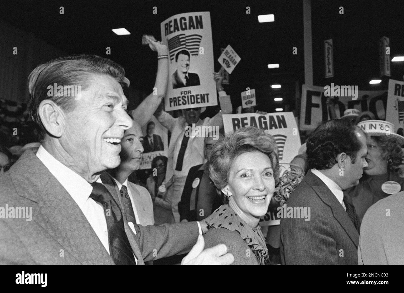 Republican presidential candidate Ronald Reagan and his wife Nancy Reagan are cheered as they enter onto the floor of the Florida Republican Presidential Preference Convention in Kissimmee Saturday, Nov. 17, 1979. (AP Photo) Stock Photo