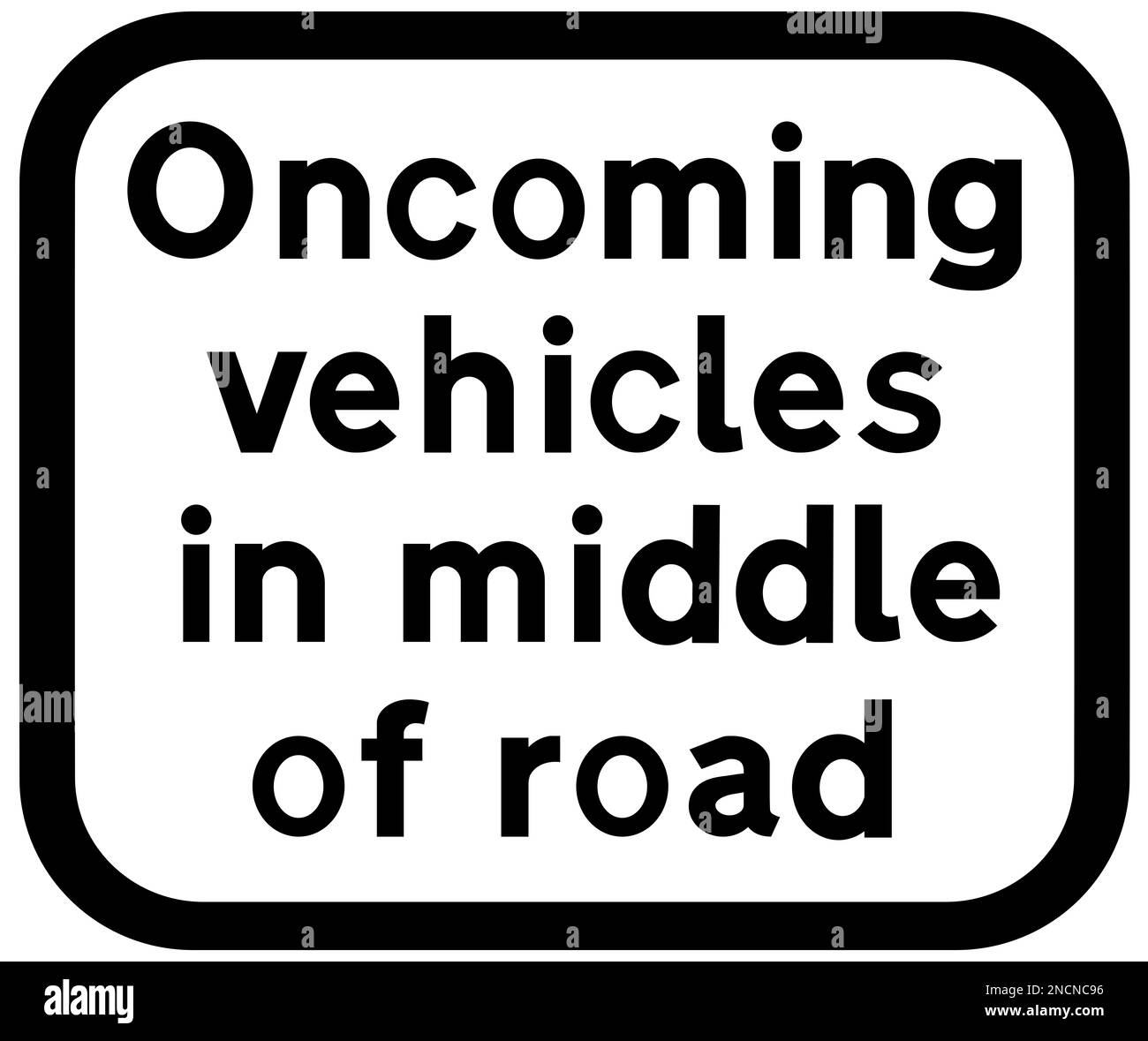 vehicles in middle of road ahead British road sign Stock Photo