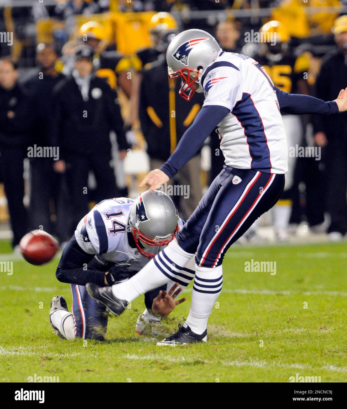 New England Patriots kicker Shayne Graham kicks a field goal in the first  half against the Pittsburgh Steelers out of the hold of Zoltan Mesko during  an NFL football game in Pittsburgh