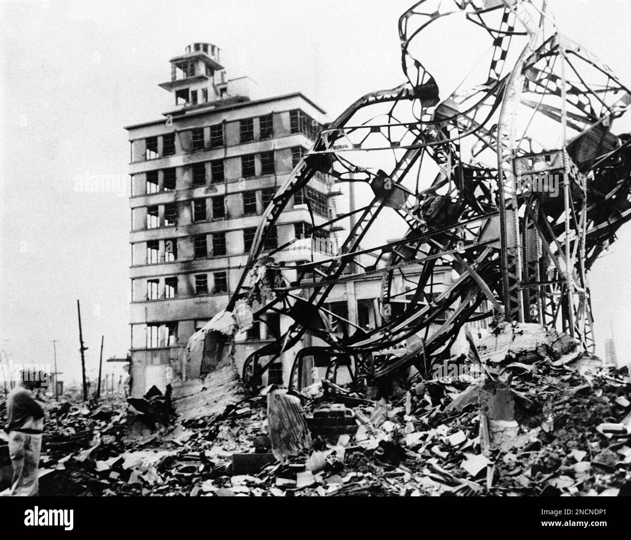 A twisted mass of steel, marks the site of a large building in the ...