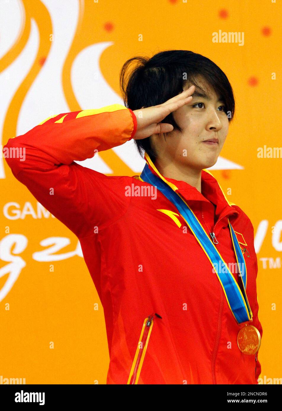 China s Jiao Liuyang Salutes As She Stands On The Podium After China s Jiao Liuyang Salutes As She Stands On The Podium After